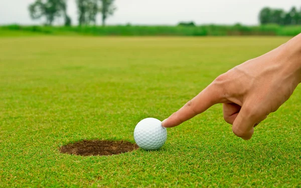 Golf cheating Stock Image