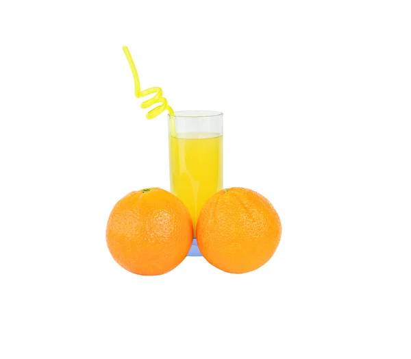 Апельсини і сік — стокове фото