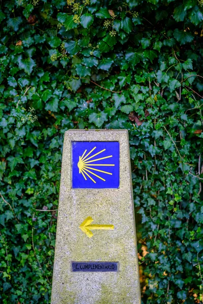 Granite Post Yellow Icon Blue Background Indicating Camino Santiago Galicia —  Fotos de Stock