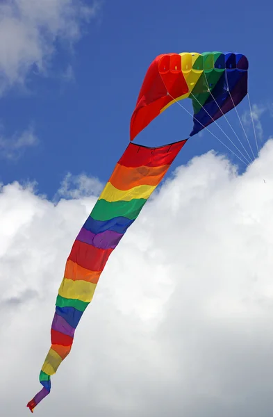 Colorful kite in a blue sky — Stock Photo, Image