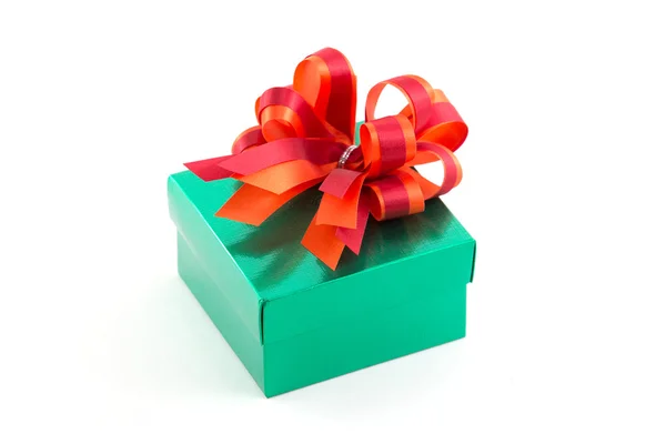 Green gift box with red satin bow isolated on white background — Stock Photo, Image