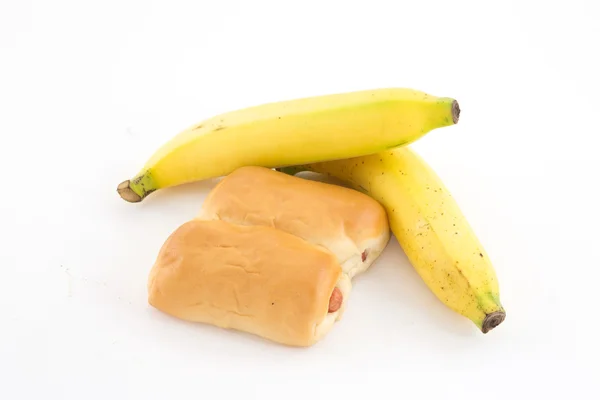 Banán a buchta izolovaných na bílém pozadí — Stock fotografie