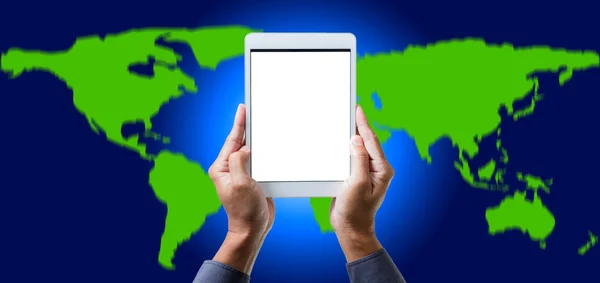 Man hand hold digital tablet computer over world map background — Stock Photo, Image