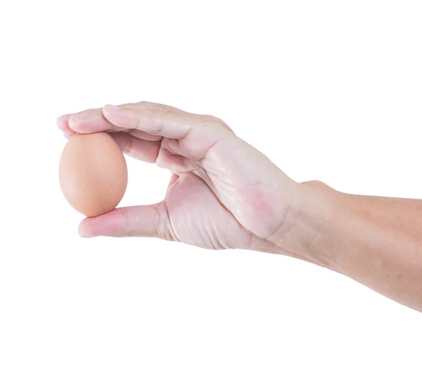 Mano de hombre con un huevo aislado sobre fondo blanco, camino de recorte — Foto de Stock