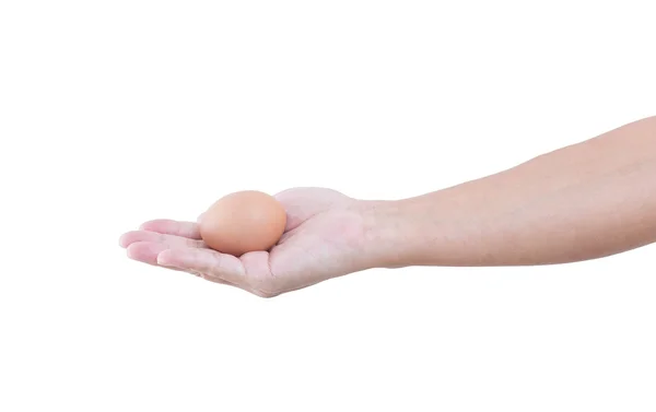 Mano de hombre con un huevo aislado sobre fondo blanco, camino de recorte — Foto de Stock