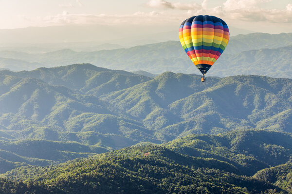 Hot air balloon over the mountain