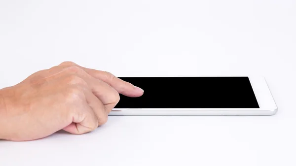 Άνθρωπος χέρι αγγίζει μαύρη οθόνη tablet σε άσπρο φόντο — Φωτογραφία Αρχείου