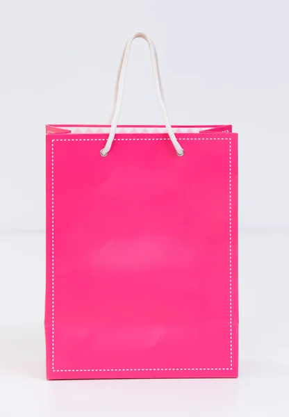 Pink shopping bag on white background — Stock Photo, Image