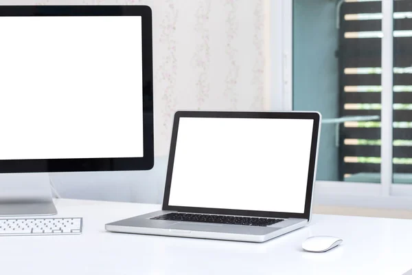 Blank screen of laptop and desktop computer — Stock Photo, Image