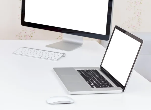 Blank screen of laptop and desktop computer — Stock Photo, Image