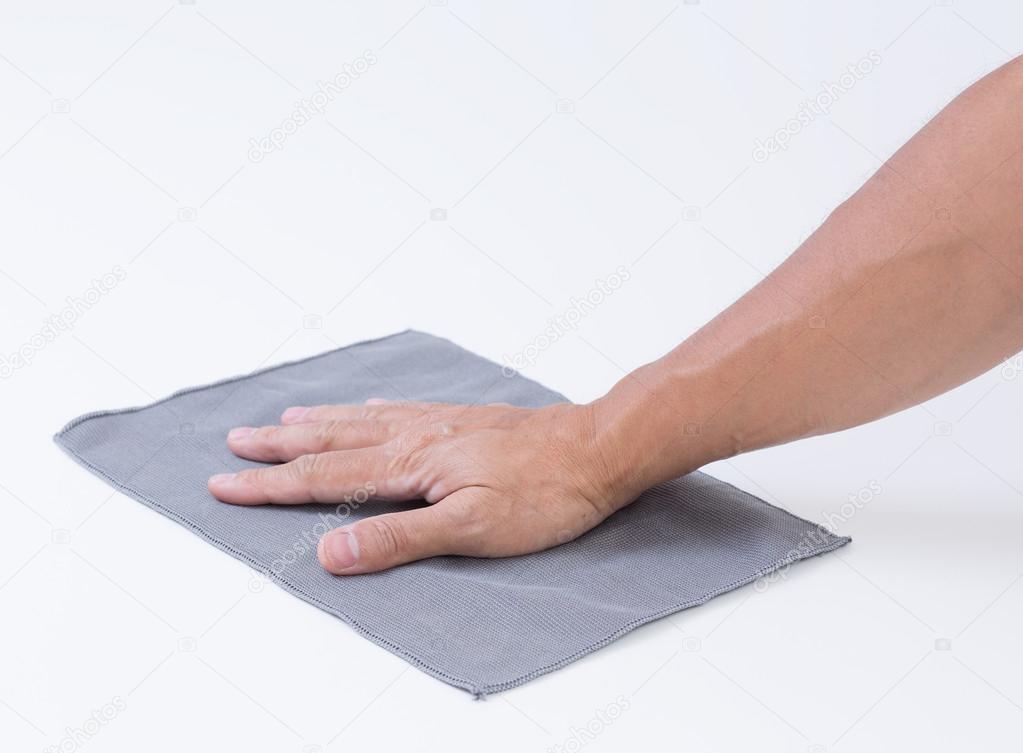 Man hand with rag cleaning the floor