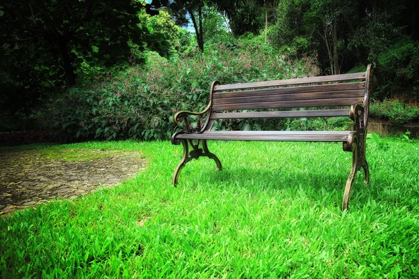 Vintage Bench in the garden — Stock Photo, Image