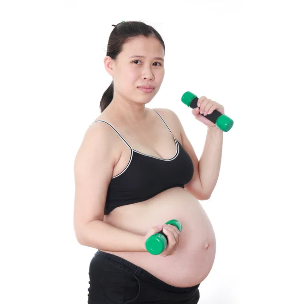 Hamile kadın üzerinde beyaz backg izole dumbbells ile egzersiz — Stok fotoğraf