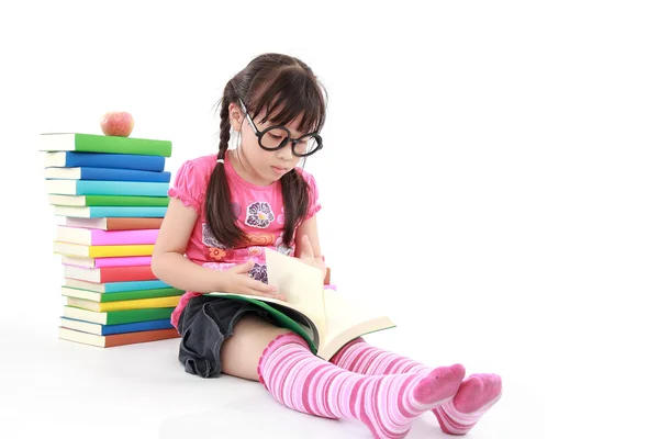 Student little asian girl reading a book — Stock Photo, Image