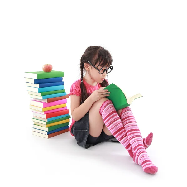 Student little asian girl reading a book — Stock Photo, Image