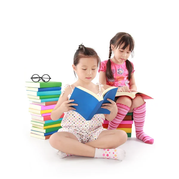 Student little asian girl reading a book — Stock Photo, Image