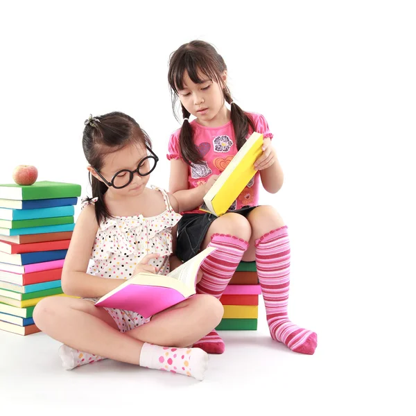 Student little asian girl reading a book — Stock Photo, Image