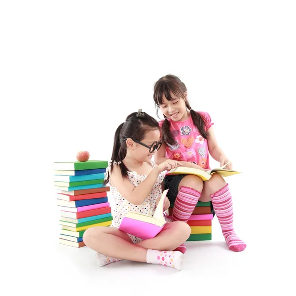 Student little asian girl reading a book — Stock Photo, Image