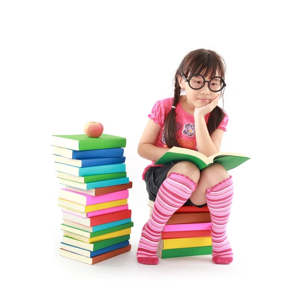 Student little asian girl reading a book — Stock Photo, Image