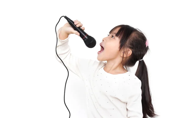 Jolie petite fille avec le microphone à la main — Photo