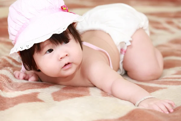 Baby girl in the bed — Stock Photo, Image