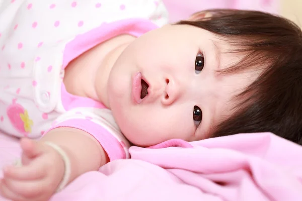 Baby girl in the bed — Stock Photo, Image