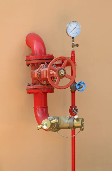 Fire hose on a wall — Stock Photo, Image
