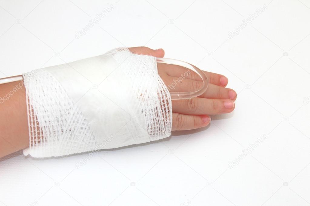 Children hand with bandage