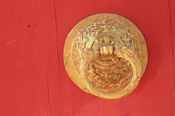 Old golden door handle knocker — Stock Photo, Image