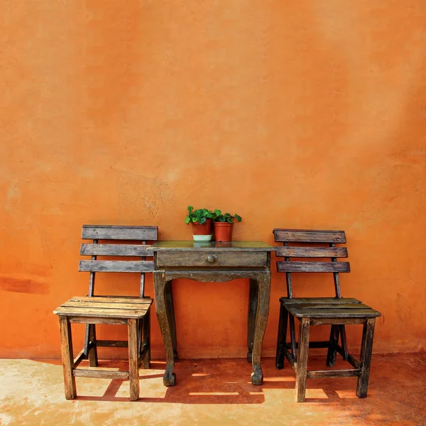 Old vintage wooden chair and table — Stock Photo, Image