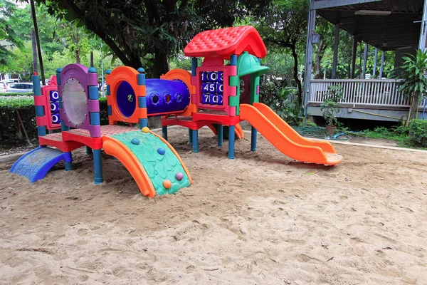 Colorful children play park equipment — Stock Photo, Image