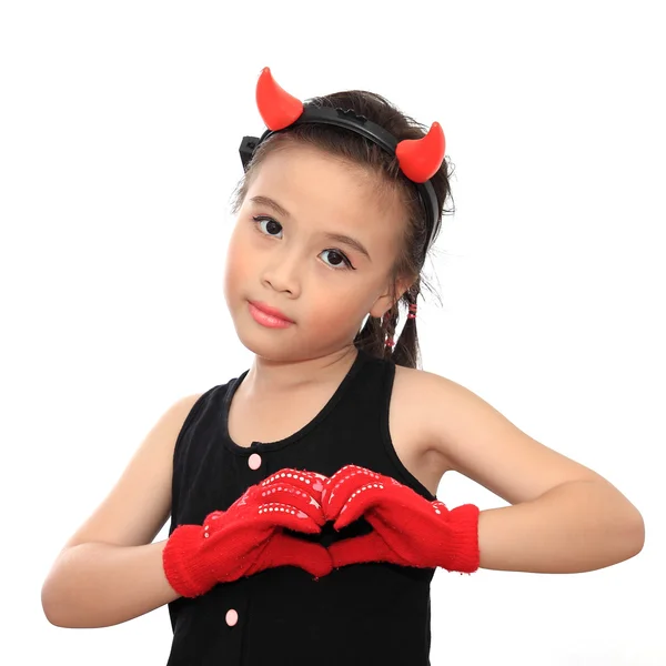 Beautiful little asian girl with heart sign — Stock Photo, Image