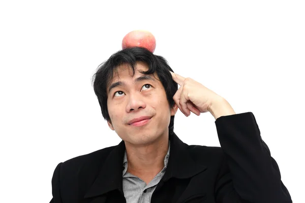 Obchodní muž si představu s červené jablko na hlavu — Stock fotografie