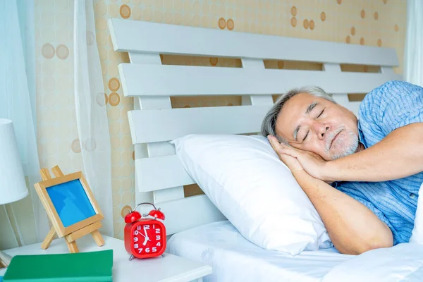 Portrait asian senior man asleep in bedroom , Old elderly male health care and Retirement concept.