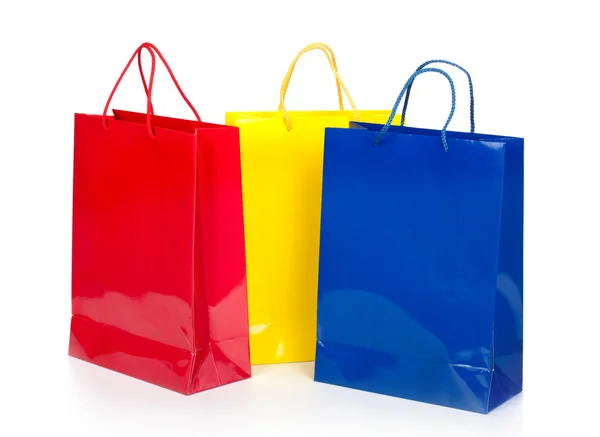 Colorful shopping bags in row — Zdjęcie stockowe