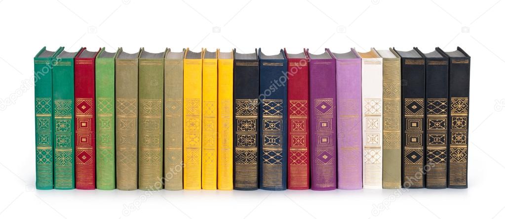 Vintage books in a row, isolated on white background, clipping path, empty labels with free copy space