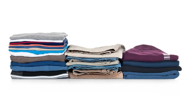 yığınları üzerinde beyaz izole giyim