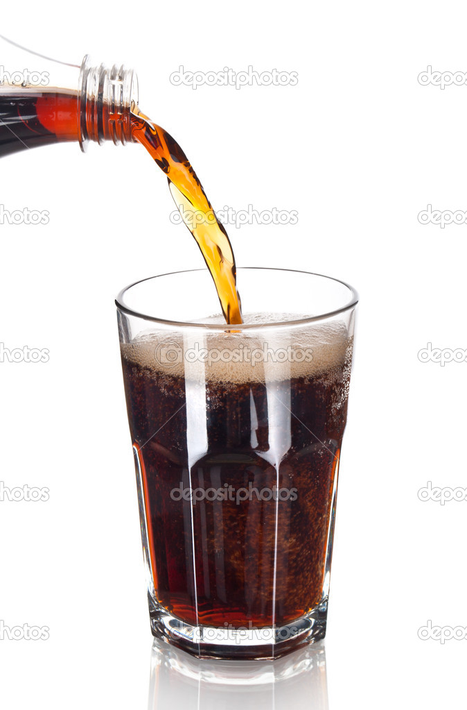 Pouring Cola isolated on white