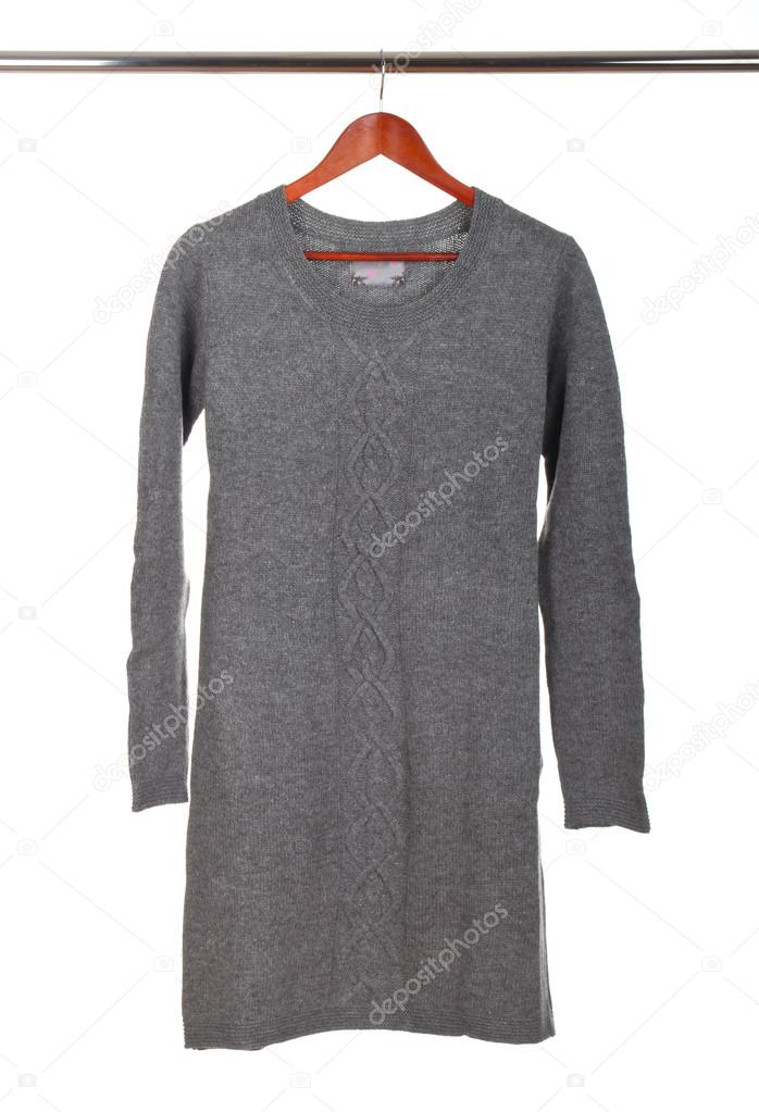 Female winter grey pullover on a hanger isolated