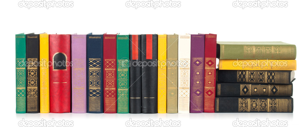 Old antique books against a white background