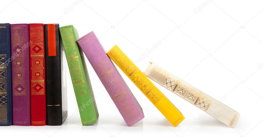 Row of vintage books isolated on white background, free copy space