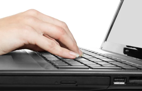 Vrouw handen werken op laptop toetsenbord op witte achtergrond — Stockfoto