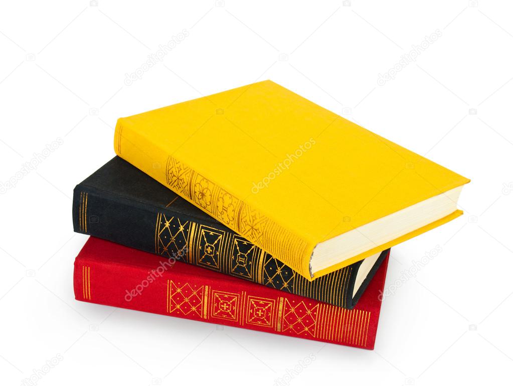 Stacked old colorful books on white background