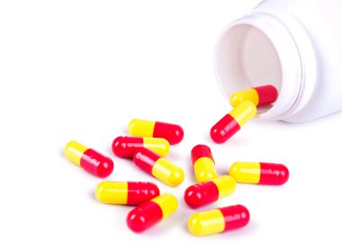 hapları üzerinde beyaz şişe