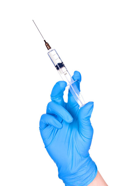 Hand holding syringe isolated on white