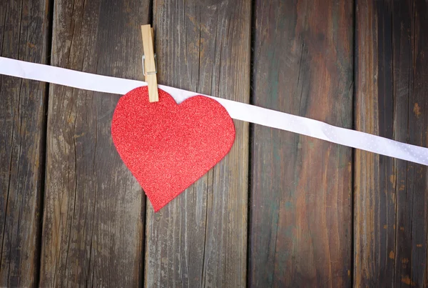 Glitter heart over wood background — Stock Photo, Image