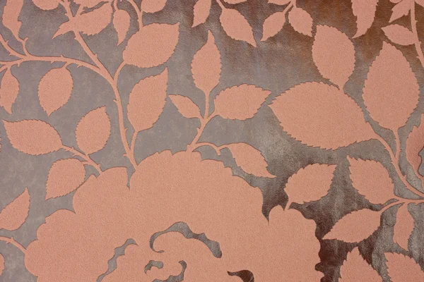 Bruine weefsel achtergrond met bloemmotief — Stockfoto