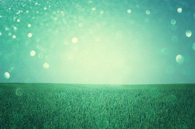 Open field view with defocused lights, or fantasy abstract background with glitter lights, cross process effect clipart