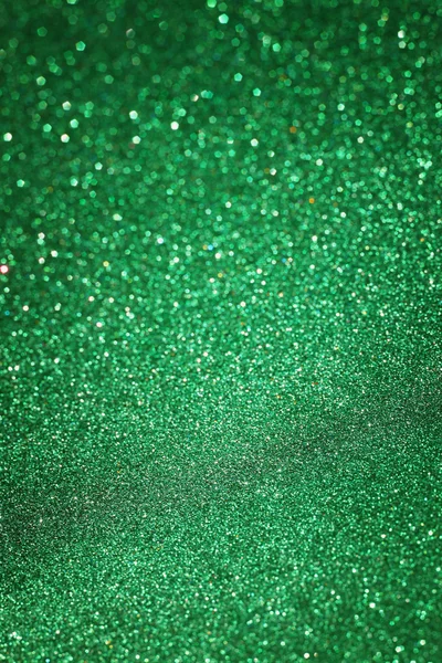 Abstraktní zelený třpyt světla nebo vánoční pozadí — Stock fotografie