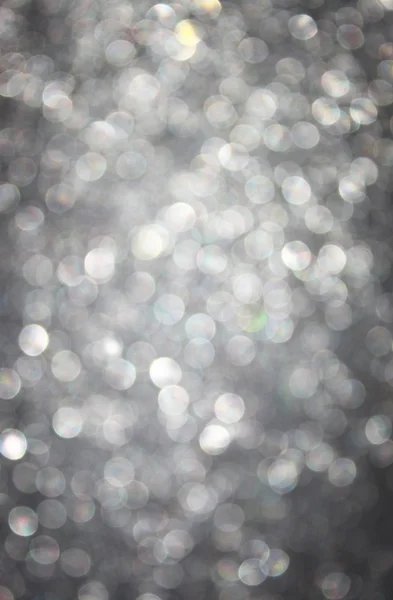 Defocused lights background. abstract silver bokeh lights. — Stock Photo, Image